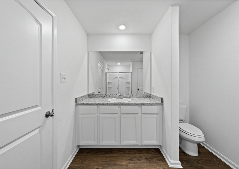 Tons of counterspace is found in the master bathroom