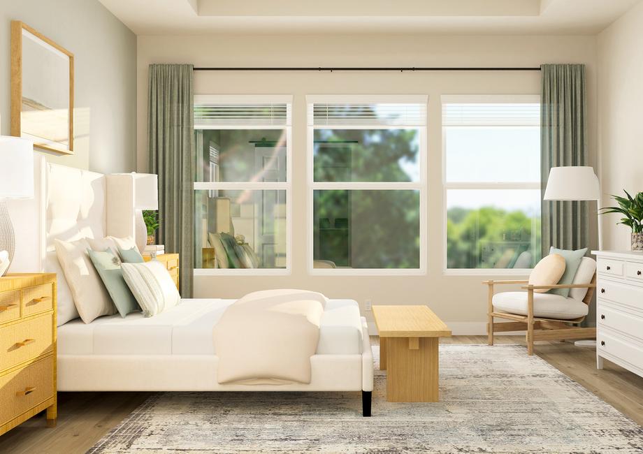 Rendering of the master suite in the
  Laurel floor plan highlighting the wall of windows for natural light. The
  room has wood-look flooring and is furnished with a bed, nightstand, dresser
  and armchair.