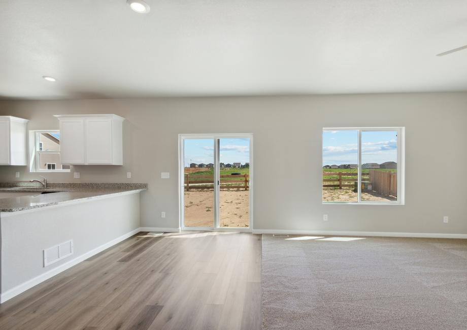 The windows in the dining room and family room let in great natural light.