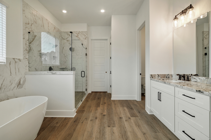 Enjoy a spa-inspired primary bathroom.