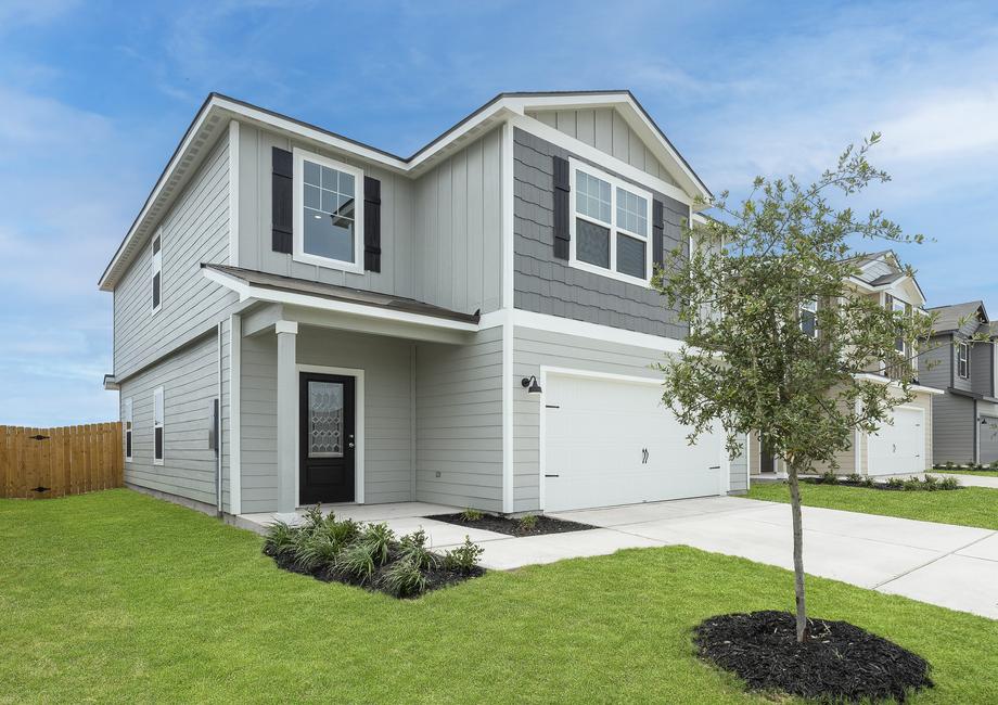 Angled exterior of the Torres with a covered front porch.