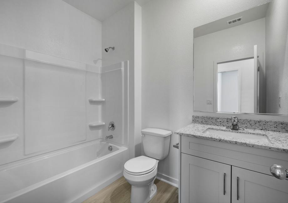 The secondary bathroom has a tub shower combo.