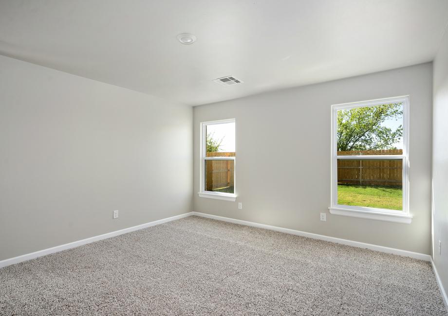 The master bedroom has two windows that let in great natural light.