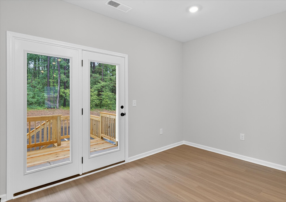 The dining room connects to the back door. 