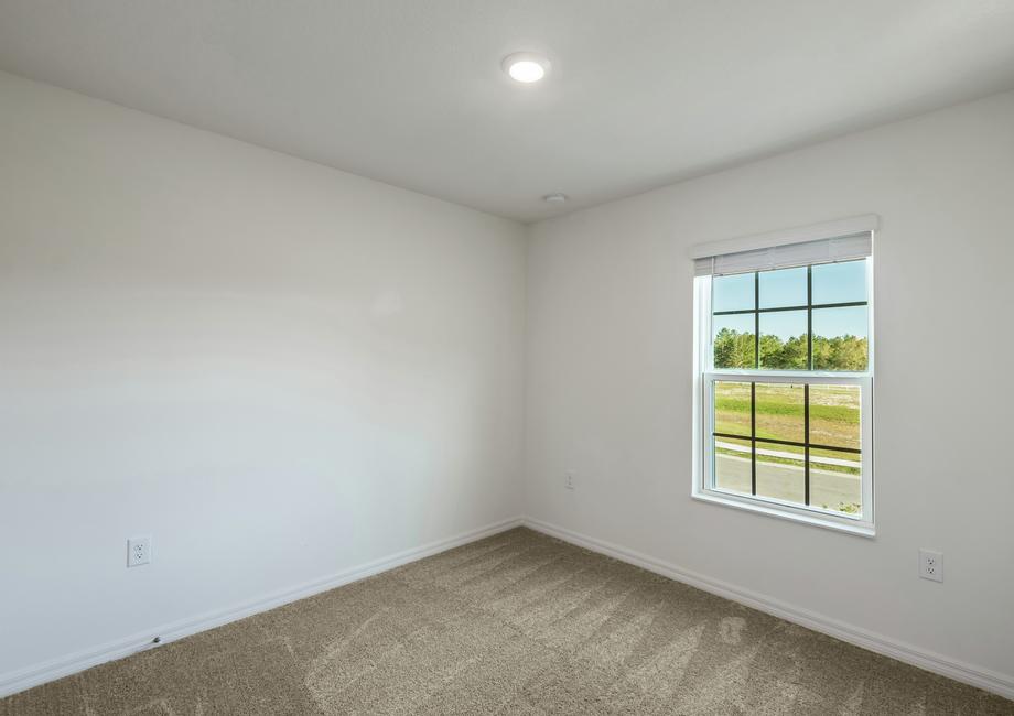 The guest bedrooms are spacious with plenty of natural light