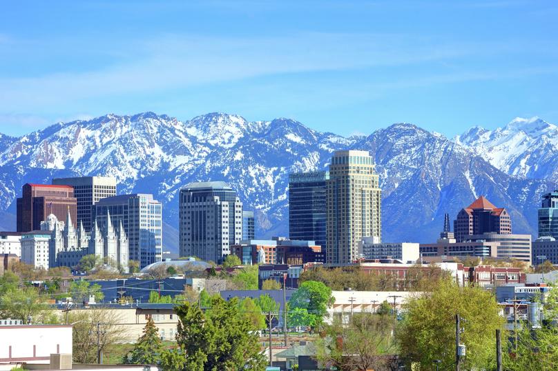 Salt Lake City skyline with mountains in the background.