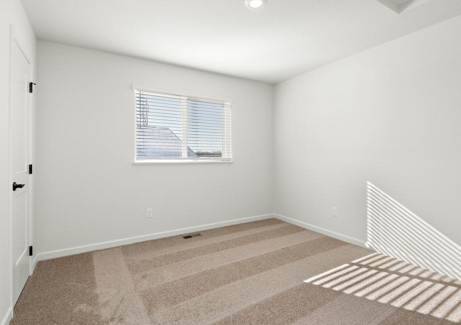 The guest bedroom is spacious