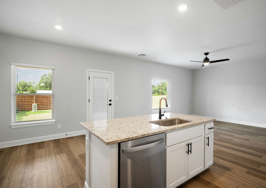 The kitchen has a wonderful kitchen island.