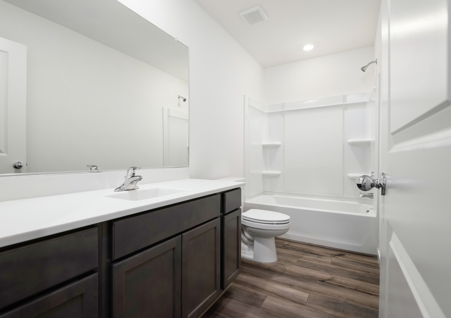 Secondary bathrooms make getting ready easy.