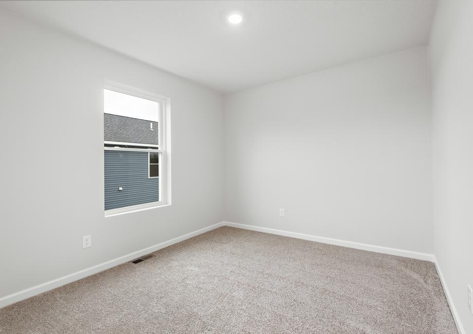 The secondary bedroom has carpet.