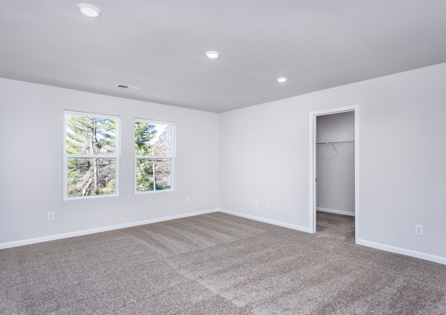 The master bedroom has enough space for king sized furniture