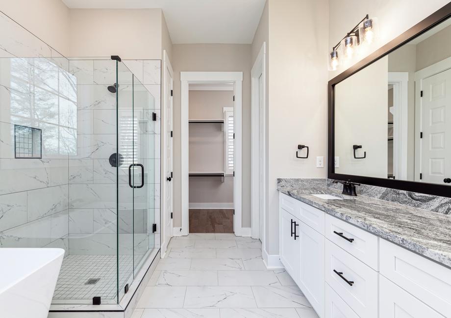 The master bathroom has an incredible standalone tub and an enviable shower.