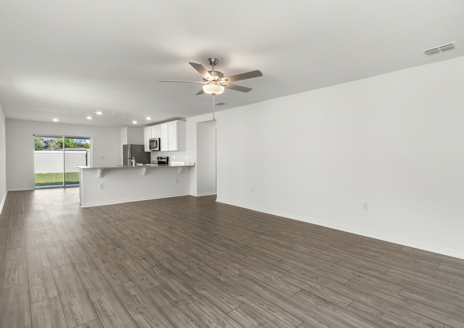 Vinyl flooring is found throughout the main areas