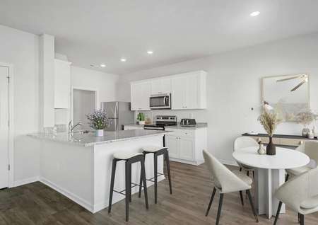 The kitchen opens in to the dining room.