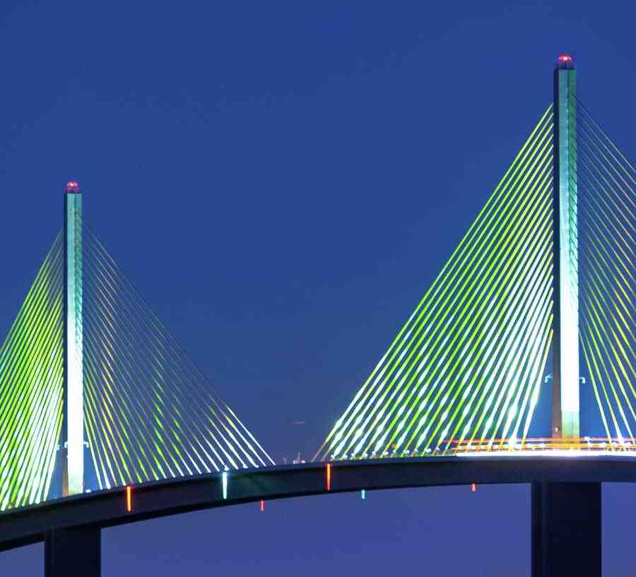 Tampa, Florida Saint Petersburg Skyway Bridge at night with suspension wires lit up green