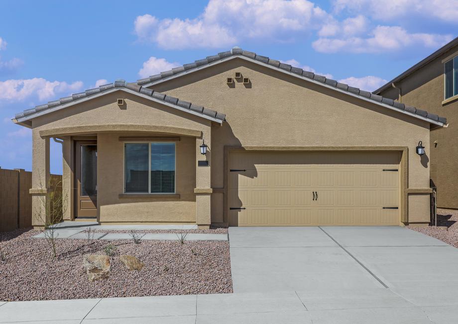 Exterior of the Prescott with desert landscaping and a two-car garage.