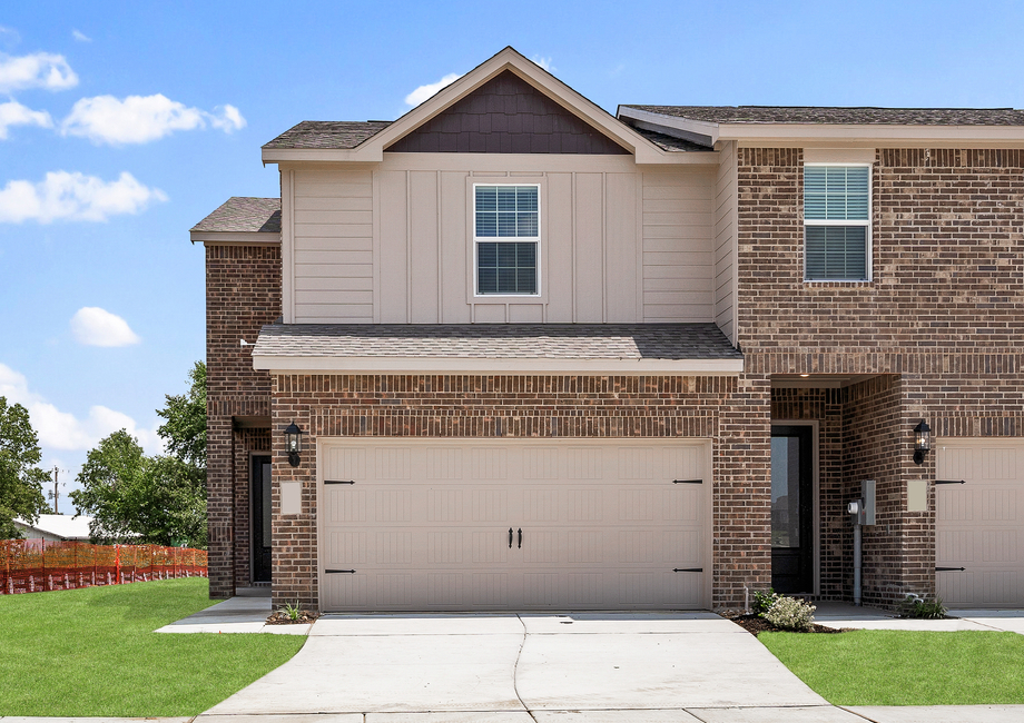 The Noma is a gorgeous floor plan with a brick exterior and siding accents.