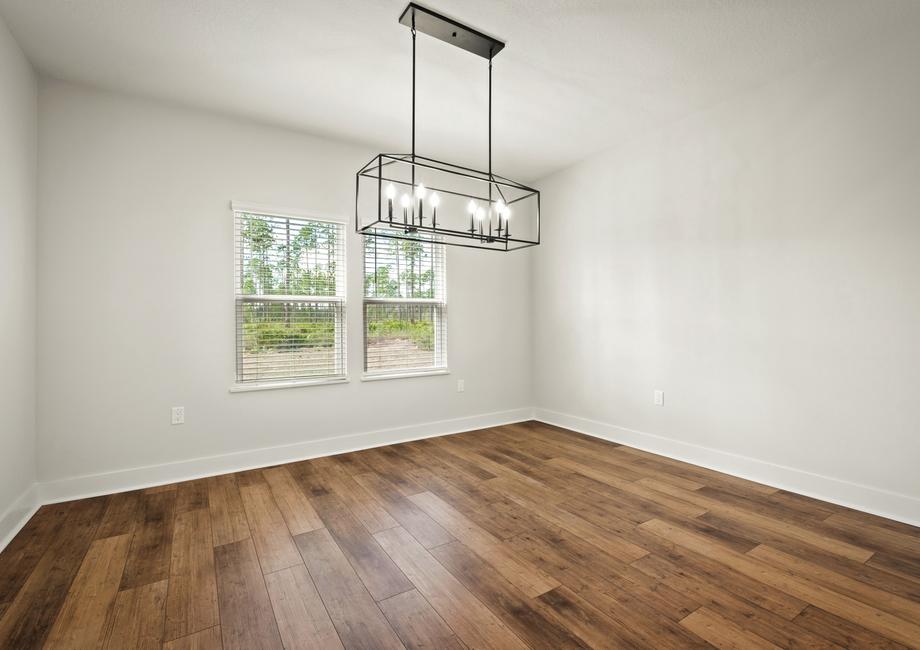 The breakfast area is spacious and offer views of the large back yard.