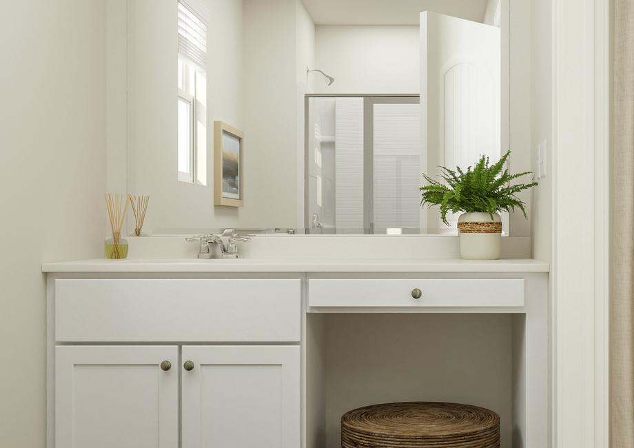 Rendering of the master bath showing the
  white cabinet vanity with a stool for the makeup vanity. The shower is
  reflected in the mirror.