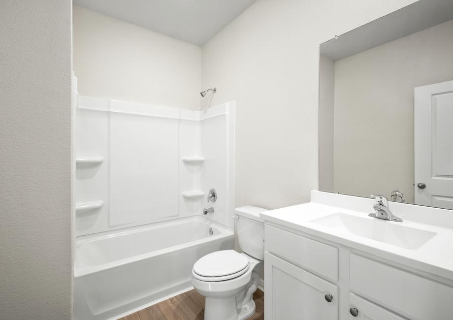 The secondary bathroom with a tub/shower combination.