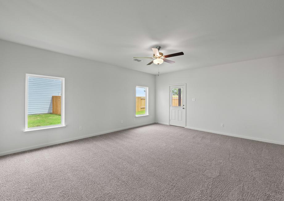 The spacious family room is perfect for family living and hosting.