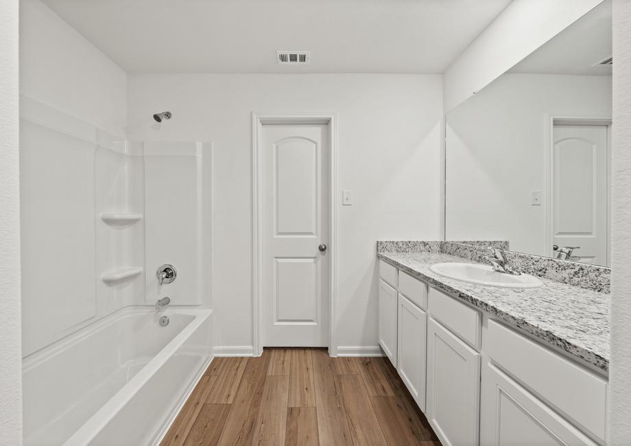 The master bathroom has plenty of counter space