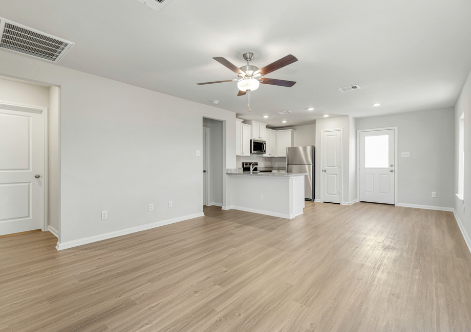 Open floor plan with vinyl flooring