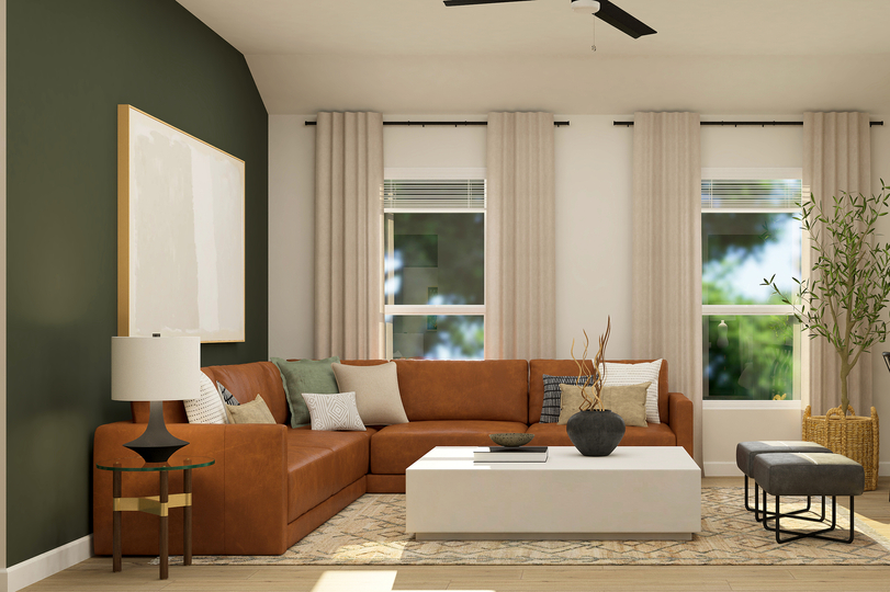 Rendering of a
  living room furnished with a leather sectional couch and a large white coffee
  table.