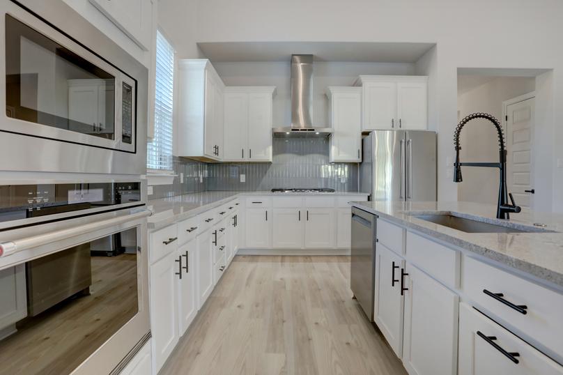 Chef-ready kitchen with stainless steel appliances and a timeless elegance.