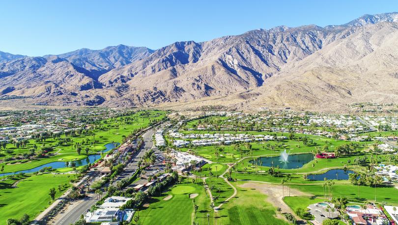A beautiful aerial of Palm Springs and Palm Desert taking during a gorgeous blue-sky morning.
