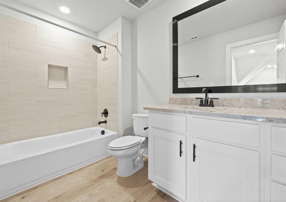 Each bathroom offers plenty of storage.