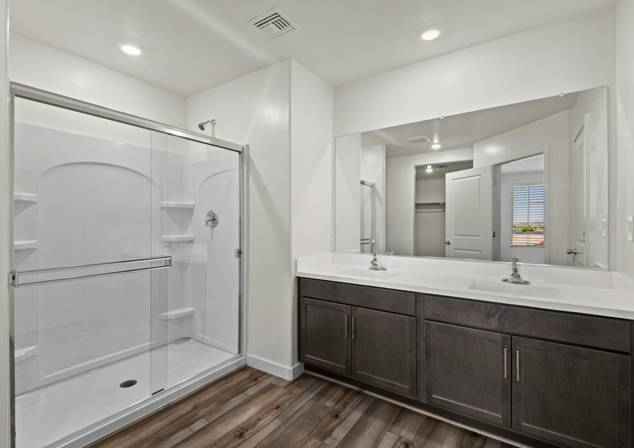 Enjoy a dual-vanity sink in this spacious bathroom!