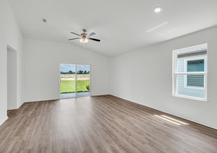 The spacious family room lets in a gorgeous amount of bright, natural light