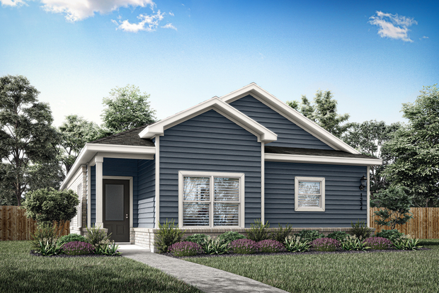 The Tulip is a one-story, siding home with brick detailing.