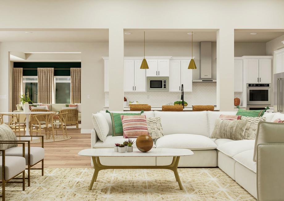 Rendering of the living room showing a
  white couch and coffee table, matching accent chairs, a view of the secondary
  living room as well as dining nook and kitchen in the background.