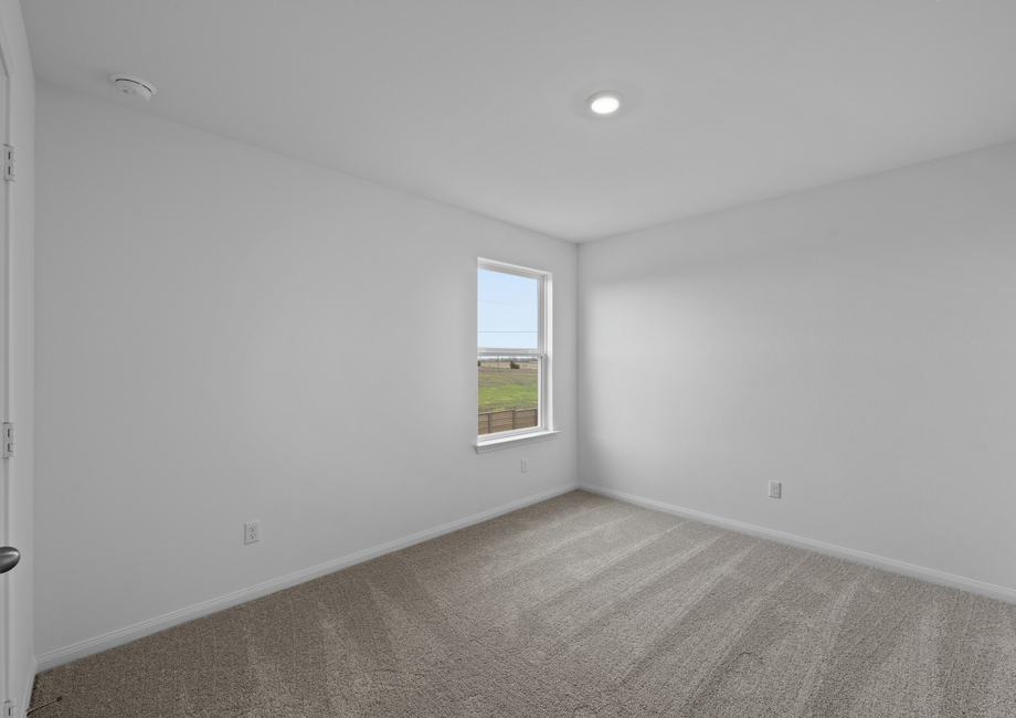 Each bedroom has lush carpet and a closet