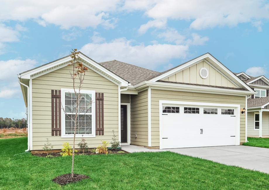 The Fairfield is a beautiful home with front yard landscaping.