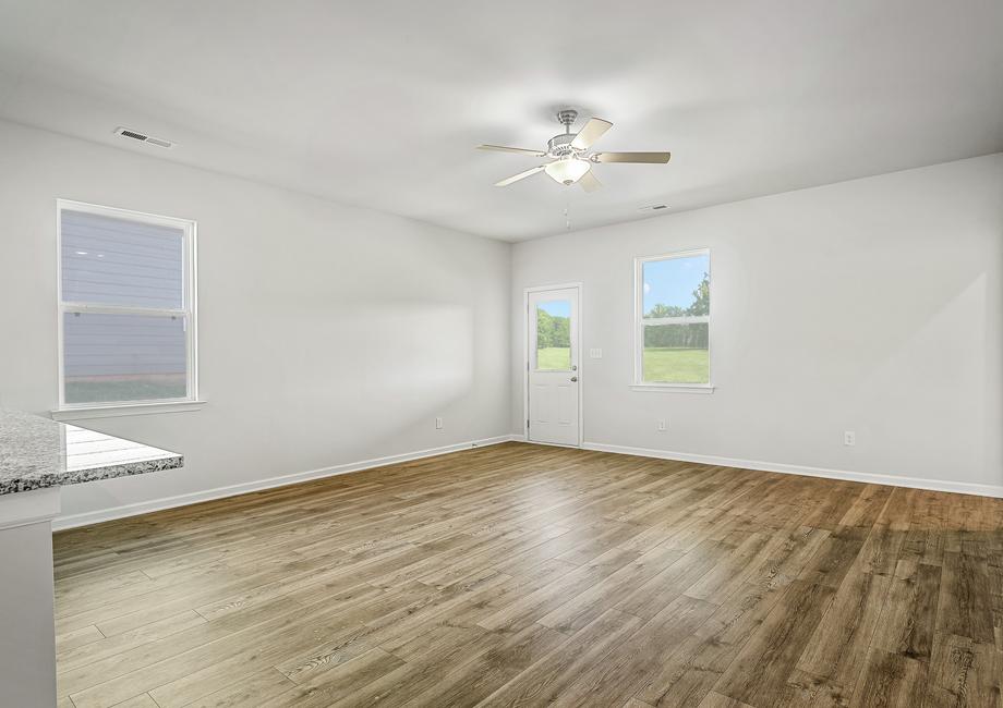 The spacious family room also has room for a dining table.