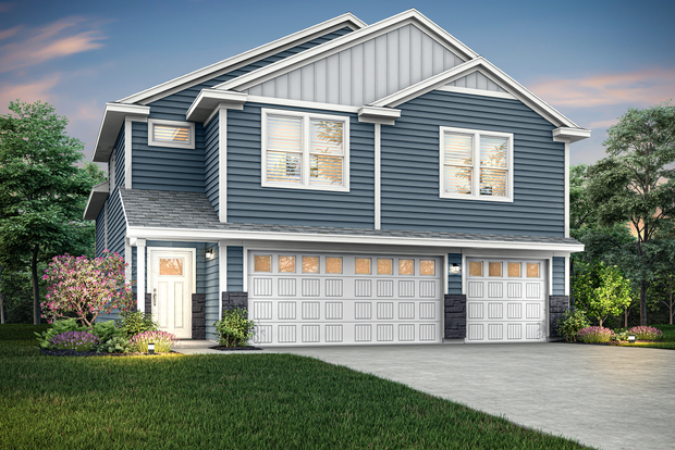 The Rachel is a beautiful two story home with siding and stone.