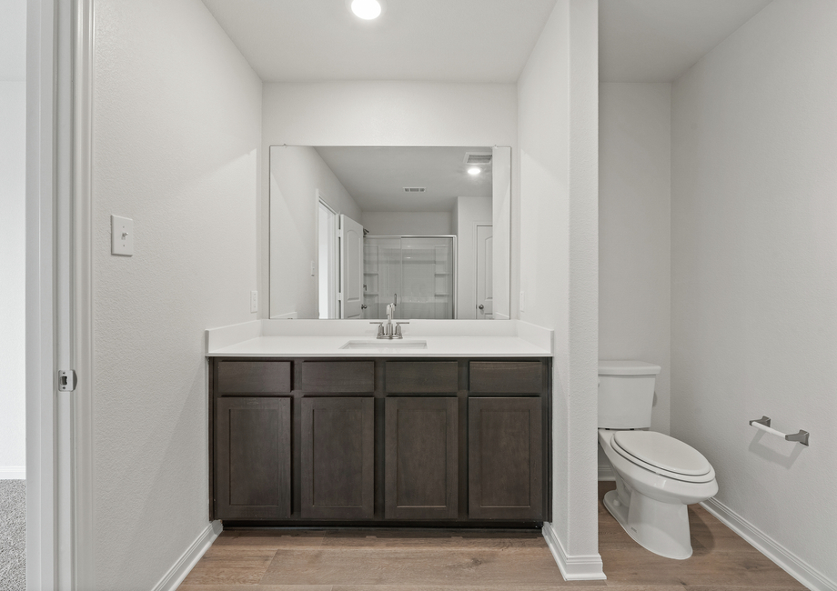 The master bathroom of the Blanco has a large vanity space.