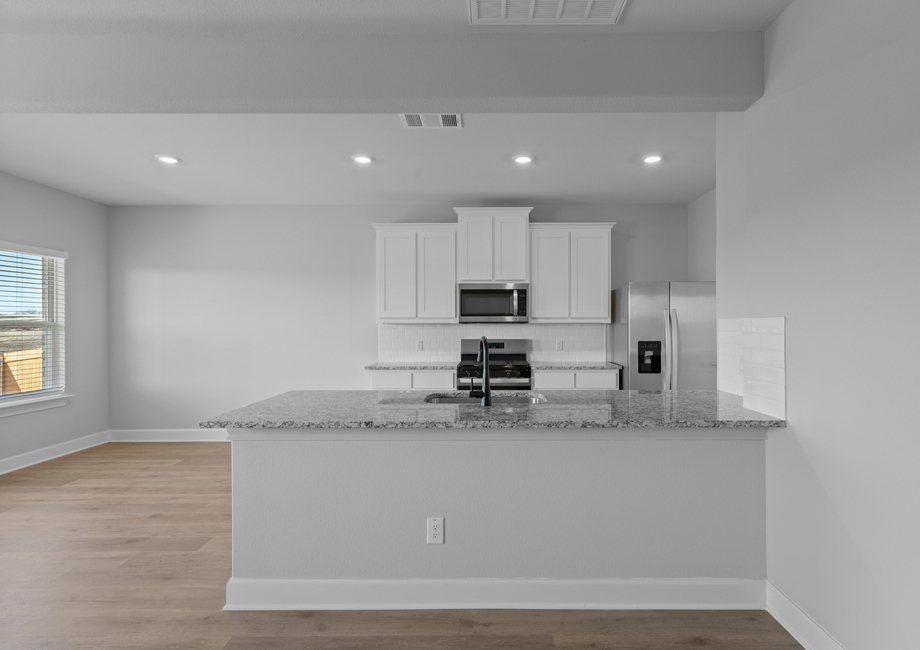 The dining room sits right off of the kitchen.