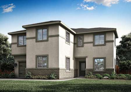 The Cameron is a beautiful two story duet home with stucco, brick and green accents.