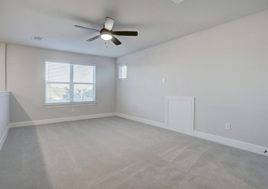 Upstairs loft creates the perfect space for a game room.