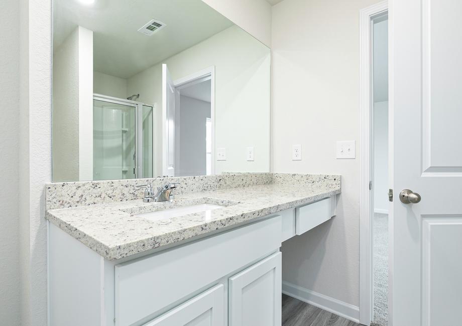 The Camden's spacious master bathroom offers a sizeable vanity area
