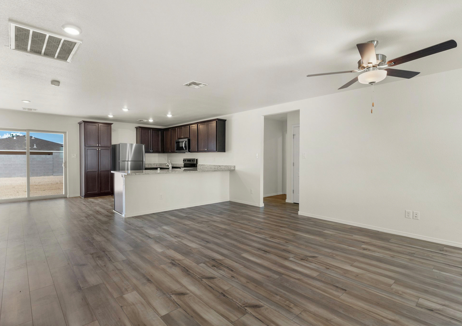 This spacious living room opens to the kitchen.