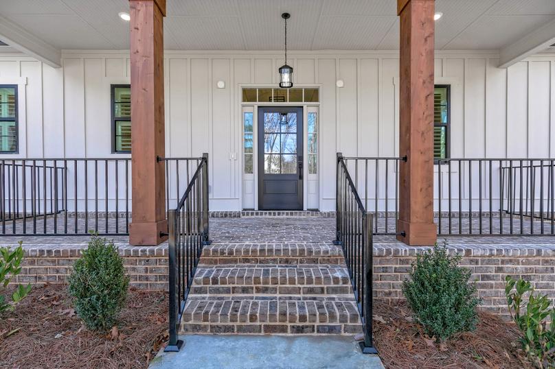 Front porch with brick flooring.