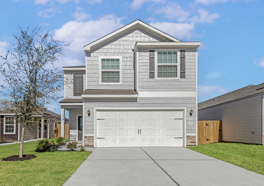 Exterior of the two-story Mesquite plan with front yard landscaping