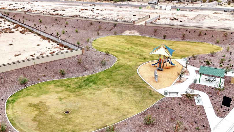 The park is comprised of spacious green space and a playground perfect for kids of all ages.