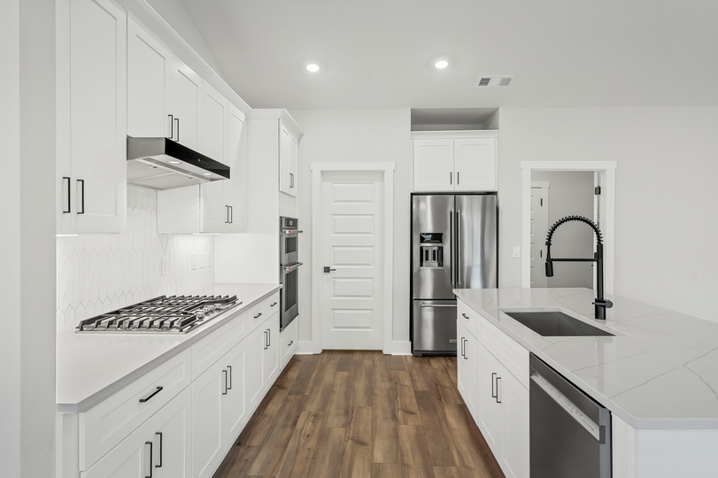 Stainless steel appliances are included.