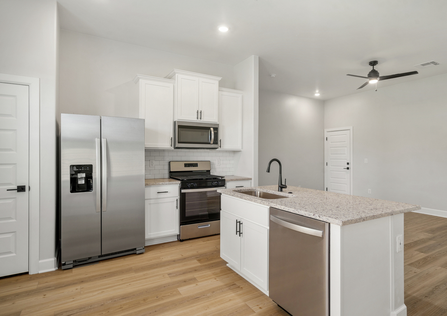 The gorgeous kitchen has upgraded, stainless-steel appliances.